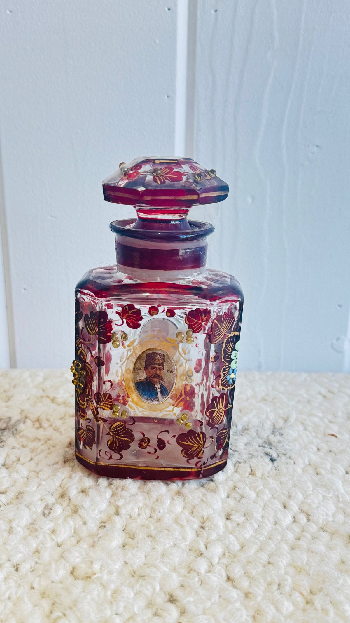 Two antique Persian Bohemian cut glass scent bottles/ portray of Nasser al-din shah Qajar